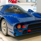Image of the rear of the blue Nissan R390 GT1 road car as it appears in Nissan's Global Headquarters, dated 2015.